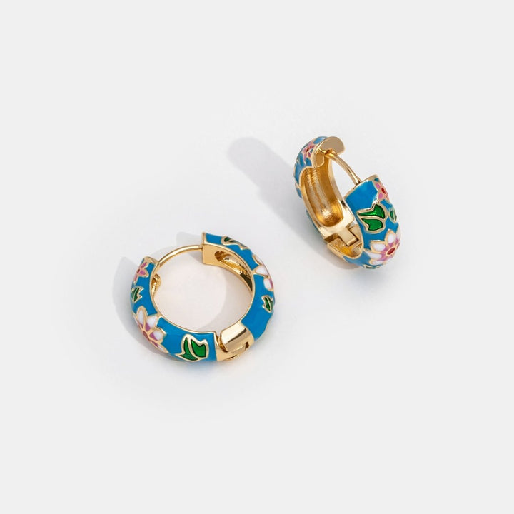 DELACROIX | BOUCLES D’OREILLES EN CERCLE DORÉ AVEC FLEUR